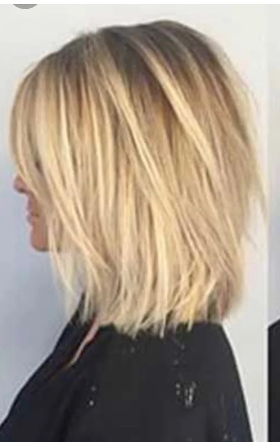 Textured blonde bob haircut photographed from the side